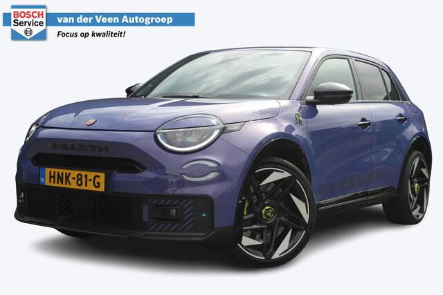 Abarth 600e Abarth Scorpionissima 54 kWh 282PK | Fabrieksgarantie | Kuipstoelen | Cruise control Adaptief | Apple Carplay/Android Auto | Parkeercamera | Half leder/alcantara | Voorruit verwarming | Parkeersensoren | Bluetooth | Navigatie |