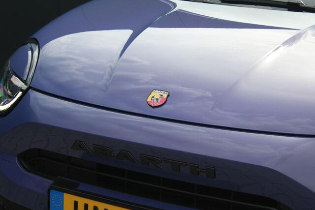 Abarth 600e Abarth Scorpionissima 54 kWh 282PK | Fabrieksgarantie | Kuipstoelen | Cruise control Adaptief | Apple Carplay/Android Auto | Parkeercamera | Half leder/alcantara | Voorruit verwarming | Parkeersensoren | Bluetooth | Navigatie |