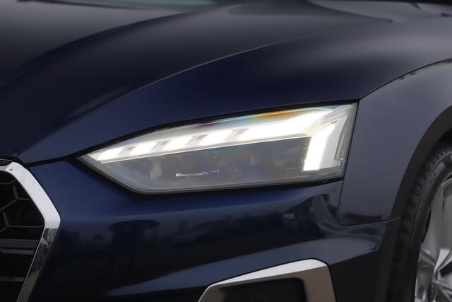 Audi A5 Sportback 35 TDI S-Line edition Automaat Navarra Blue Full LED Wegklapbare Trekhaak Virtual Cockpit Navigatie Achteruitrijcamera Clima Cruise Parkeersensor Half Leder Sportstoelen Draadloos Carplay