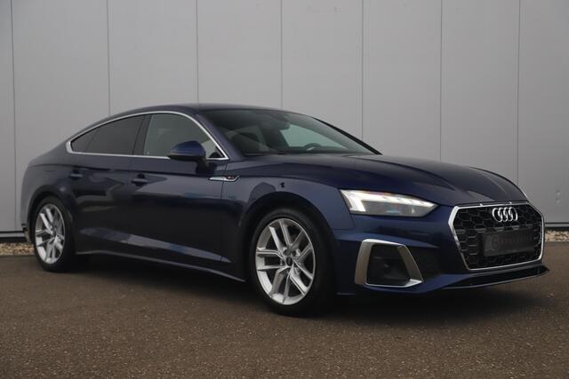 Audi A5 Sportback 35 TDI S-Line edition Automaat Navarra Blue Full LED Wegklapbare Trekhaak Virtual Cockpit Navigatie Achteruitrijcamera Clima Cruise Parkeersensor Half Leder Sportstoelen Draadloos Carplay