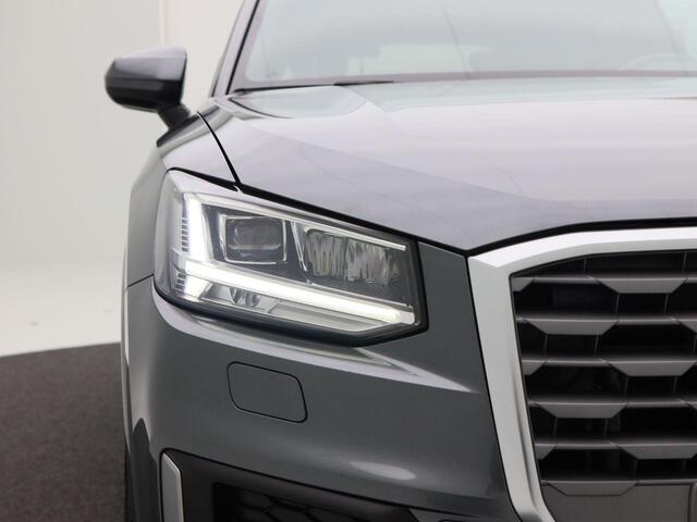 Audi Q2 1.4 TFSi 150 Pk Automaat S-Line | Cruise Control | Airco | Parkeersensoren | Trekhaak | Bluetooth | Navigatiesysteem | Privacy Glass | DAB | 18 Inch