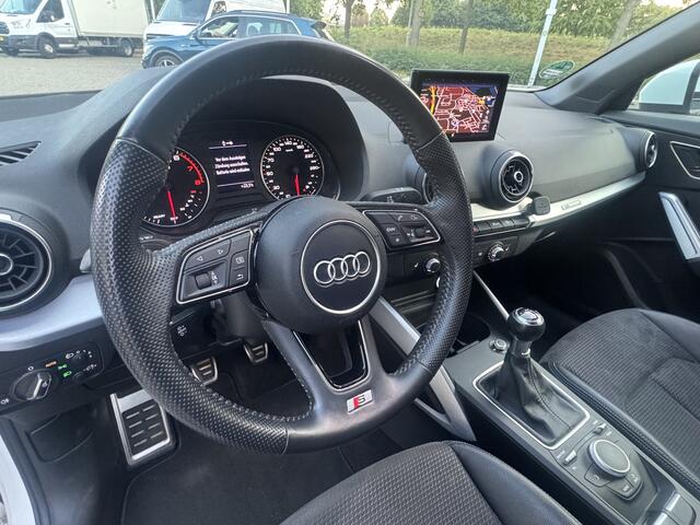 Audi Q2 1.0 TFSI S-LINE SPORT EDITION / NAVI / PDC V+A / Intresse, Proefrit? Bel of app met: 06-15025420 (Wegens de zomervakantie bezichtiging op afspraak)