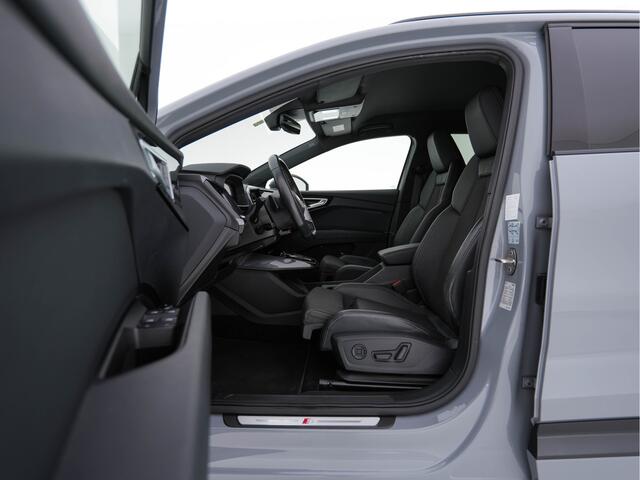 Audi Q4 e-tron 40 Launch edition S Competition 77 kWh [ 3-Fase -11kW ] {SOH-93%} (INCL-BTW) *HEATPUMP | LEATHER-FABRIC | SONOS-AUDIO | MATRIX-LED | ADAPTIVE-CRUISE | HEATED-SPORTSEATS | AMBIENTLIGHT | DIGI-COCKPIT | CAMERA | KEYLESS | DAB+ | NAVI-FULLMAP | TOWBAR | PRIV
