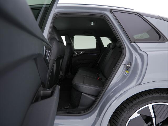 Audi Q4 e-tron 40 Launch edition S Competition 77 kWh [ 3-Fase -11kW ] {SOH-93%} (INCL-BTW) *HEATPUMP | LEATHER-FABRIC | SONOS-AUDIO | MATRIX-LED | ADAPTIVE-CRUISE | HEATED-SPORTSEATS | AMBIENTLIGHT | DIGI-COCKPIT | CAMERA | KEYLESS | DAB+ | NAVI-FULLMAP | TOWBAR | PRIV