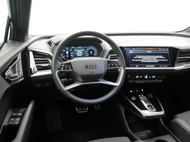 Audi Q4 e-tron 40 S-LINE 82 kWh (150kW/204pk) ** LED, NAVI+, WARMTEPOMP, ADAPT. CRUISE, 20-inch LMV ** 1e EIG - 31K onder NP - UNFALLFREI ** ** INFORMEER OOK NAAR ONZE AANTREKKELIJKE FINANCIAL-LEASE TARIEVEN **