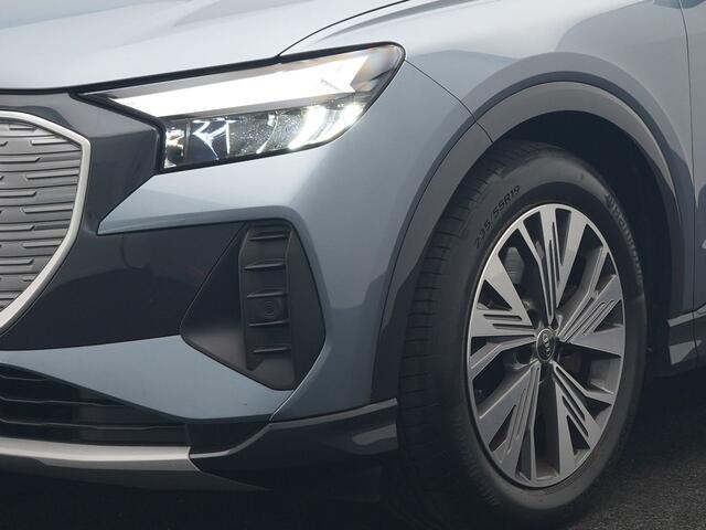 Audi Q4 e-tron 45 Quattro S Line 82 kWh 265pk Dealer O.H. | Trekhaak Af Fabriek | Panodak | Adaptive Cruise | Camera | Sportstoelen Memory & Verwarmd | Sfeerverlichting | Keyless | Navigatie | DAB |