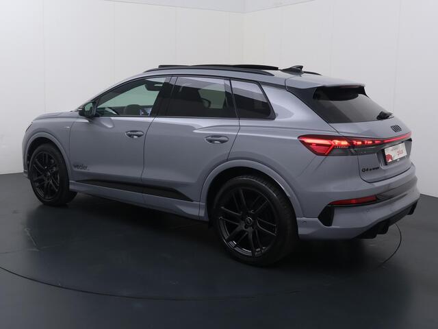 Audi Q4 e-tron S edition quattro performance 82 kWh - 340 PK / Dynamiekpakket plus / Augmented reality head-up display / S-line-interieur met sportstoelen en zwarte stoffen-kunstlederen bekleding / Lichtpakket plus met ambient lighting/ Matrix led koplampen / Panoramada