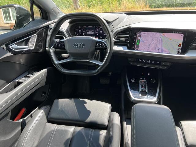 Audi Q4 e-tron 40 Launch edition Advanced Plus 77 kWh / SOH 93%/ AUTOMAAT/ LEER/ WARMTEPOMP/ CRUISE/ PARK.SENSOREN V+A/ CAMERA/ SMARTPHONE INTERFACE/ STOELVERWARMING/ DIGITAL DASH/ NAVI/ CLIMA/ 21'' LMV