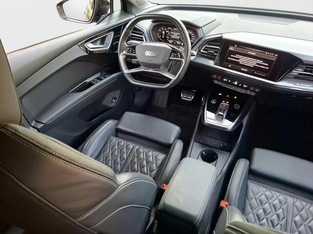 Audi Q4 e-tron 50 quattro S edition 77 kWh Lederen bekleding | 21 inch lichtmetalen velgen | Parkeercamera | Navigatie