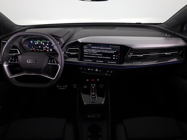 Audi Q4 e-tron 45 S edition Competition e-tron 82 kWh 286 pk | Navigatie | Stoelverwarming | Assistentiepakket plus | Comfortpakket | Ambient lichtpakket | Optiekpakket zwart plus | 20 inch Lichtmetalen velgen