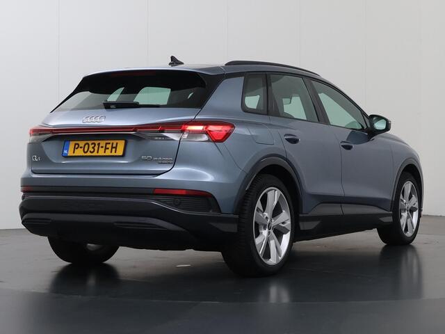 Audi Q4 e-tron 50 quattro Launch edition Advanced Plus 77 kWh | SOH 93% | Sportstoelen | HUD | Virtual CockPit | Ele.verstelbare stoelen + Geheugen | Camera | DAB | Apple CarPlay/Android Auto | Stoelverwarming | Adaptieve Cruise Control | SONOS Audio | Ele.kofferdeksel | Trekhaak |