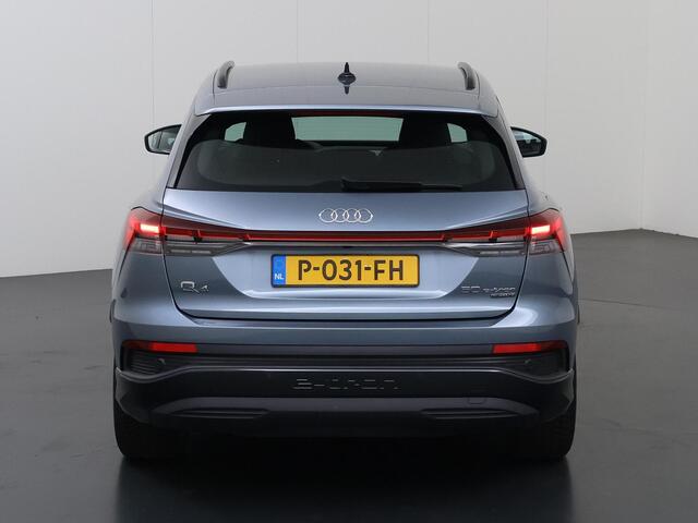 Audi Q4 e-tron 50 quattro Launch edition Advanced Plus 77 kWh | SOH 93% | Sportstoelen | HUD | Virtual CockPit | Ele.verstelbare stoelen + Geheugen | Camera | DAB | Apple CarPlay/Android Auto | Stoelverwarming | Adaptieve Cruise Control | SONOS Audio | Ele.kofferdeksel | Trekhaak |