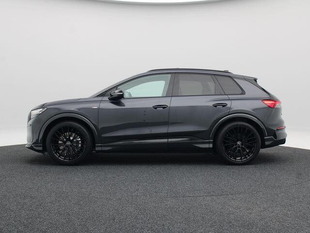 Audi Q4 e-tron S edition 45 | 82 kWh | 286 PK | 21 inch velgen | Privacyglas | Trekhaak | Panoramadak | Zwart optiek |