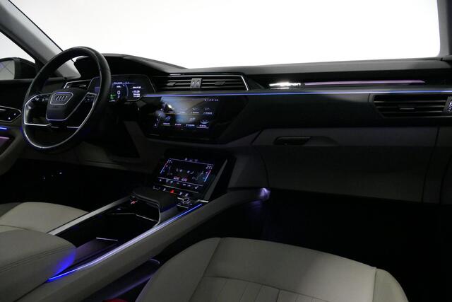 Audi e-tron 55 quattro Business Edition Plus 95 kWh / Panoramadak / Elektr. verstelbare voorstoelen (links memory) / Luchtvering / Apple Carplay - Android Auto / Ambienteverlichting / Matrix LED koplampen / Stoelverwarming / Achteruitrijcamera / Adaptive Cruise Contr