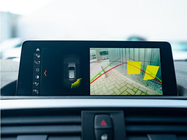 BMW 1-SERIE 118i High Executive | Leder | Camera | Parkeersensoren V&A | Stoelverwarming | Prijs Rijklaar!!