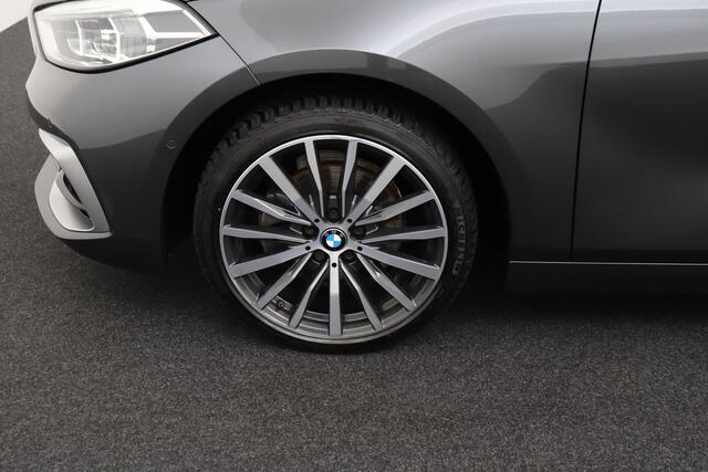 BMW 1-SERIE 118i Aut. High Exe. Trekhaak Head-up Display Camera M-SportLeder