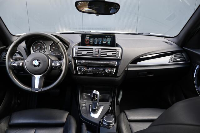 BMW 1-SERIE 118i High Executive Automaat | M-Sportstuur | Leer | Stoelverwarming | Sportstoelen | Schuif / kanteldak | M-pakket details | Professional Navi