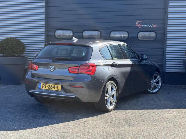BMW 1-SERIE 118i Corporate Lease High Executive | Navigatie | Lederen Bekleding | Lichtmetalen Velgen | Parkeersensoren |