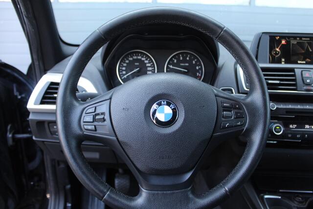 BMW 1-SERIE 116i Centennial High Executive Navigatie, Climate control, Cruisecontrol, Stoelverwarming, Licht en regen sensor
