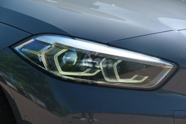 BMW 1-SERIE 118i 140pk Aut. Executive Edition | Navi | Climate | Adaptive Cruise | Keyless | Camera | Stoelverwarming