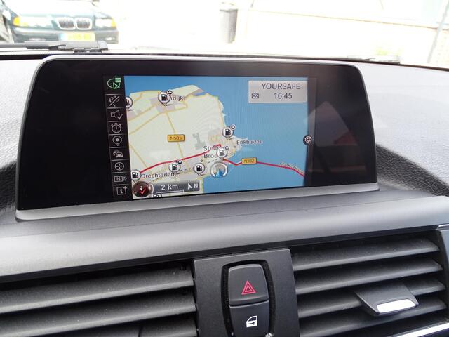 BMW 1-SERIE 116i Centennial Executive 6-Bak, Navigatie, Multimedia, Airco/ECC, CruiseControl, LM-velgen, Parkeersensoren, Multifunctioneel stuur