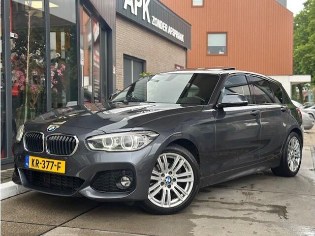 BMW 1-SERIE 118i Centennial High Executive Pano |Stoelverwarming| Leder| Navi Pro | PDC