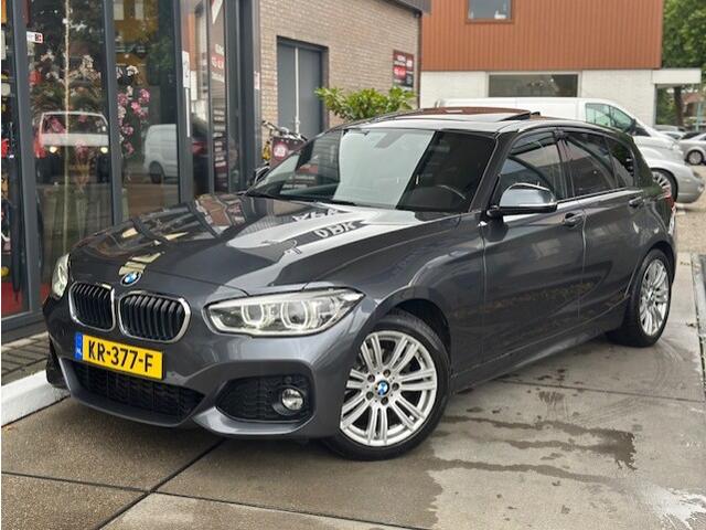 BMW 1-SERIE 118i Centennial High Executive Pano |Stoelverwarming| Leder| Navi Pro | PDC
