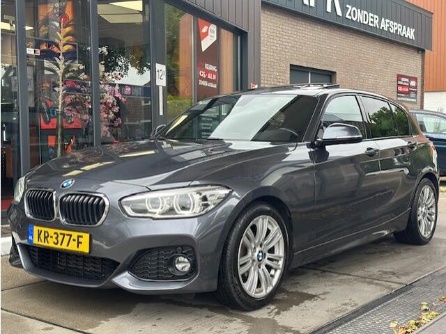 BMW 1-SERIE 118i Centennial High Executive Pano |Stoelverwarming| Leder| Navi Pro | PDC