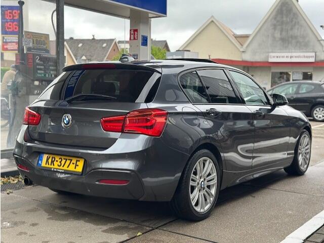 BMW 1-SERIE 118i Centennial High Executive Pano |Stoelverwarming| Leder| Navi Pro | PDC