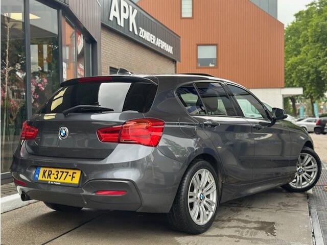 BMW 1-SERIE 118i Centennial High Executive Pano |Stoelverwarming| Leder| Navi Pro | PDC