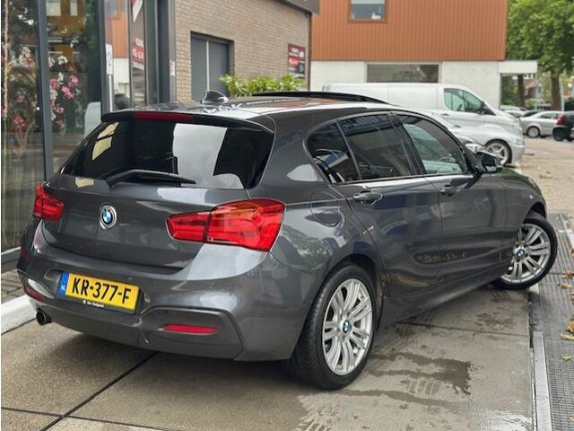 BMW 1-SERIE 118i Centennial High Executive Pano |Stoelverwarming| Leder| Navi Pro | PDC