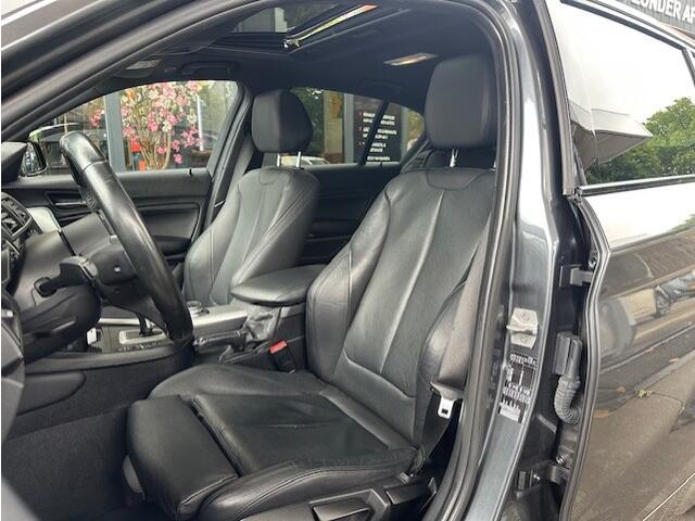 BMW 1-SERIE 118i Centennial High Executive Pano |Stoelverwarming| Leder| Navi Pro | PDC