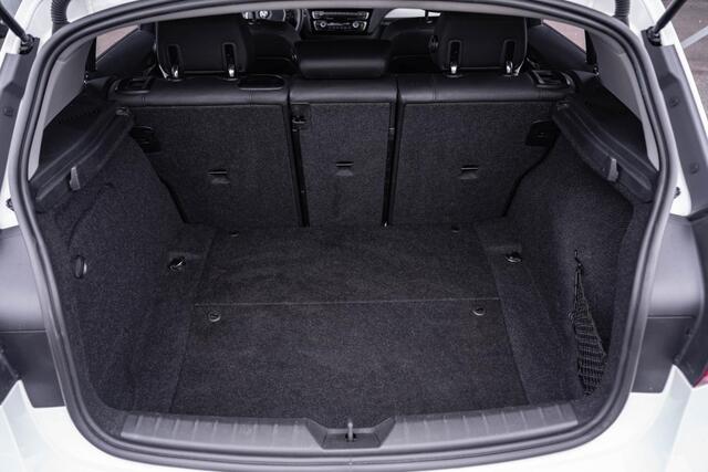 BMW 1-SERIE 116d Corporate Lease High Executive Leder Navi Camera PDC Stoelverwarming Trekhaak NAP