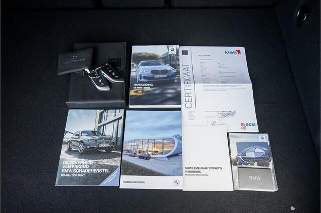 BMW 1-SERIE M135i xDrive High Ex Shadow Pano H/K Memory HUD Stuurverw