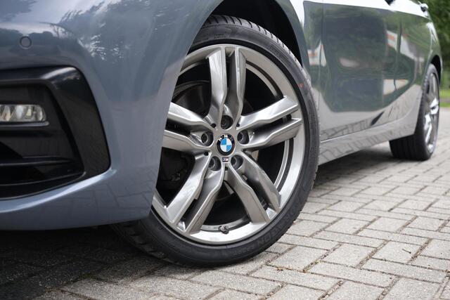 BMW 1-SERIE 116i Sportline | AUT | LED | Cruise | Sportstoelen | Half leder | Stoelverwarming | PDC voor en achter | DAB Radio | etc.