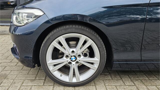 BMW 1-SERIE 118i Centennial High Executive + HARMAN KARDON + SCHUIFDAK + LED + KEYLESS