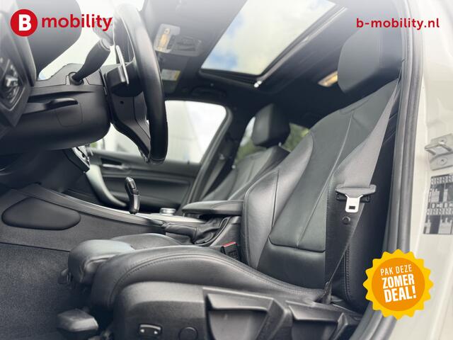 BMW 1-SERIE 118i High Executive M-Sport Automaat Schuif/Kanteldak Trekhaak | Apple CarPlay | Achteruitrijcamera | Leer | Navigatie Professional | Achteruitrijcamera | Sportstoelen | Lichtpakket | Parkassist | DAB | Hifi System | Draadloos laden