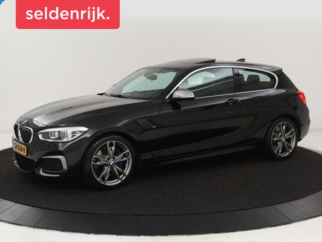 BMW 1-SERIE M140i High Executive | 2e eigenaar | Schuifdak | Leder | Harman/Kardon | Stoel & stuurverwarming | Camera | Carplay | Full LED | Navigatie