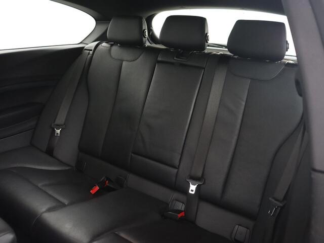 BMW 1-SERIE M140i High Executive | 2e eigenaar | Schuifdak | Leder | Harman/Kardon | Stoel & stuurverwarming | Camera | Carplay | Full LED | Navigatie