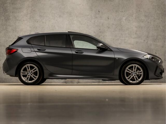 BMW 1-SERIE 118i M Sport Automaat (PANORAMADAK, M PAKKET, APPLE CARPLAY, GETINT GLAS, LEDER, SPORTSTOELEN, PARKEERSENSOREN, LANE ASSIST, DAB+, NIEUWSTAAT)