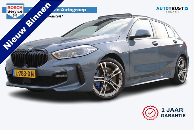 BMW 1-SERIE 118i High Executive M-sport | Incl. 12 maanden garantie | Cruise control | Kuipstoelen | Schuif/kantel dak | Climate control | Apple carplay | Navigatie | DAB radio | Harman/Kardon |
