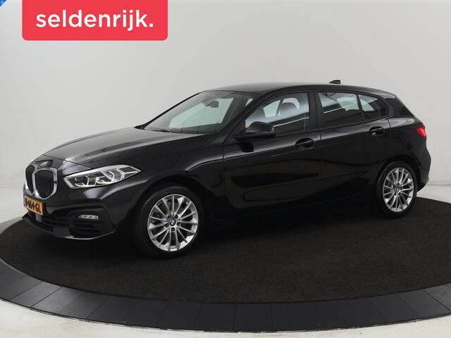 BMW 1-SERIE 120i Business Edition Plus | Leder | Sportstoelen | Carplay | Stoelverwarming | Live Cockpit | Parkeerhulp | Climate control | Bluetooth | Cruise control