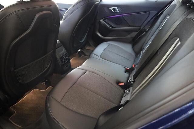 BMW 1-SERIE 118i High Executive STOELVERWARMING 18"LMV CRUISE NAVI 2xPDC CLIMA HALFLEER M-STUUR