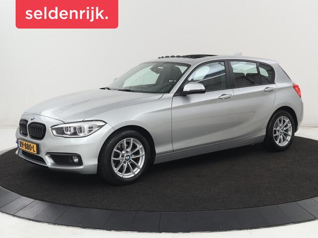 BMW 1-SERIE 118i Executive | Schuifdak | Leder | Stoelverwarming | Camera | Full LED | Navigatie | Parkeerhulp | Climate control | Bluetooth | Cruise control