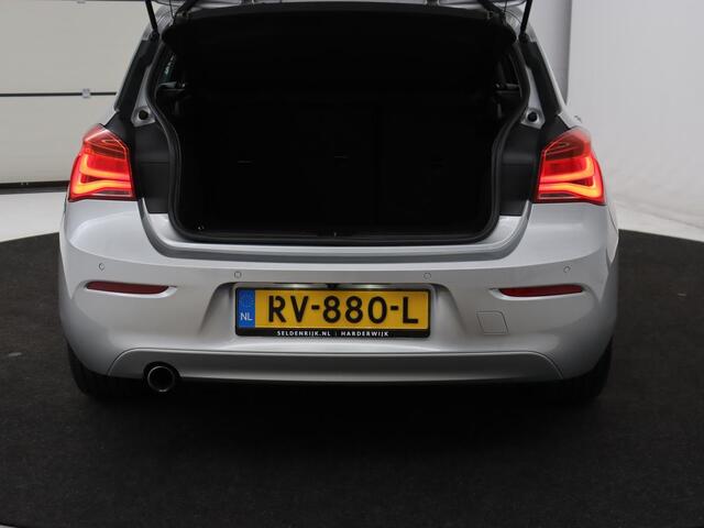 BMW 1-SERIE 118i Executive | Schuifdak | Leder | Stoelverwarming | Camera | Full LED | Navigatie | Parkeerhulp | Climate control | Bluetooth | Cruise control