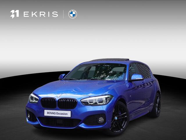 BMW 1-SERIE 118i High Executive | Model M sport | Elektrisch glazen schuif-/kanteldak | Stuurwielrand verwarmd | Active Cruise Control met Stop en Go-functie | Harman-Kardon sound system
