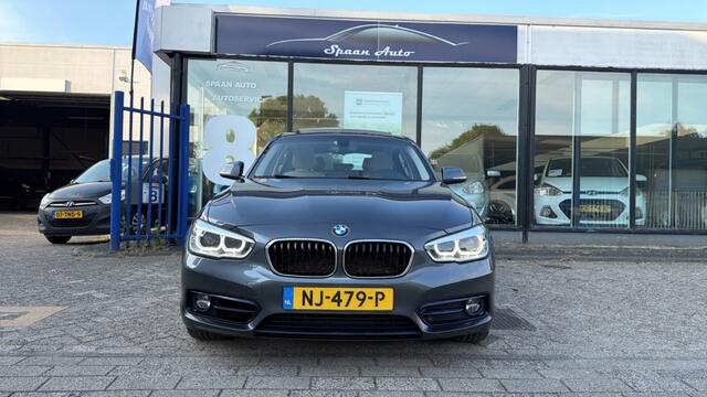 BMW 1-SERIE 118i Centennial High Executive | AUTOMAAT | PANODAK | LEER