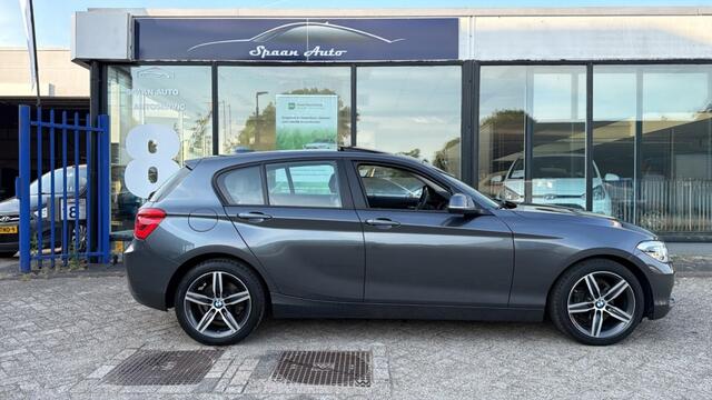 BMW 1-SERIE 118i Centennial High Executive | AUTOMAAT | PANODAK | LEER