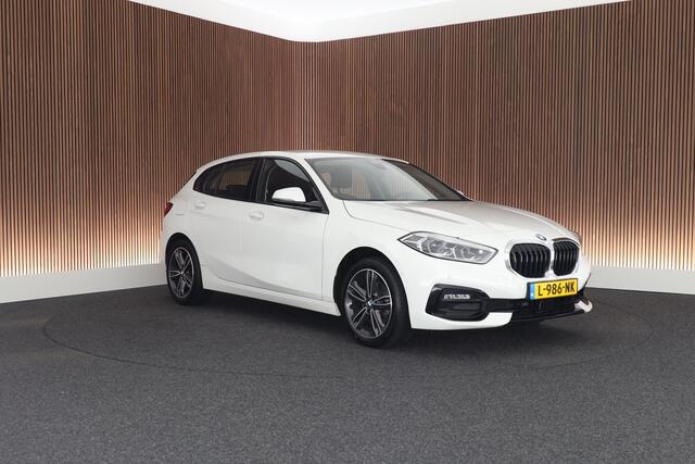 BMW 1-SERIE 118i 136pk Business Edition Plus Trekhaak Camera Leder Navigatie Stoelverwarming