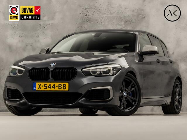 BMW 1-SERIE M140i M Sport High Executive 340Pk Automaat (6 CILINDER, M PAKKET, HARMAN/KARDON, ALCANTARA, CAMERA, SPORTSTOELEN, M SPORTREMMEN, NAVIGATIE, STOELVERWARMING, GETINT GLAS, NIEUWSTAAT)